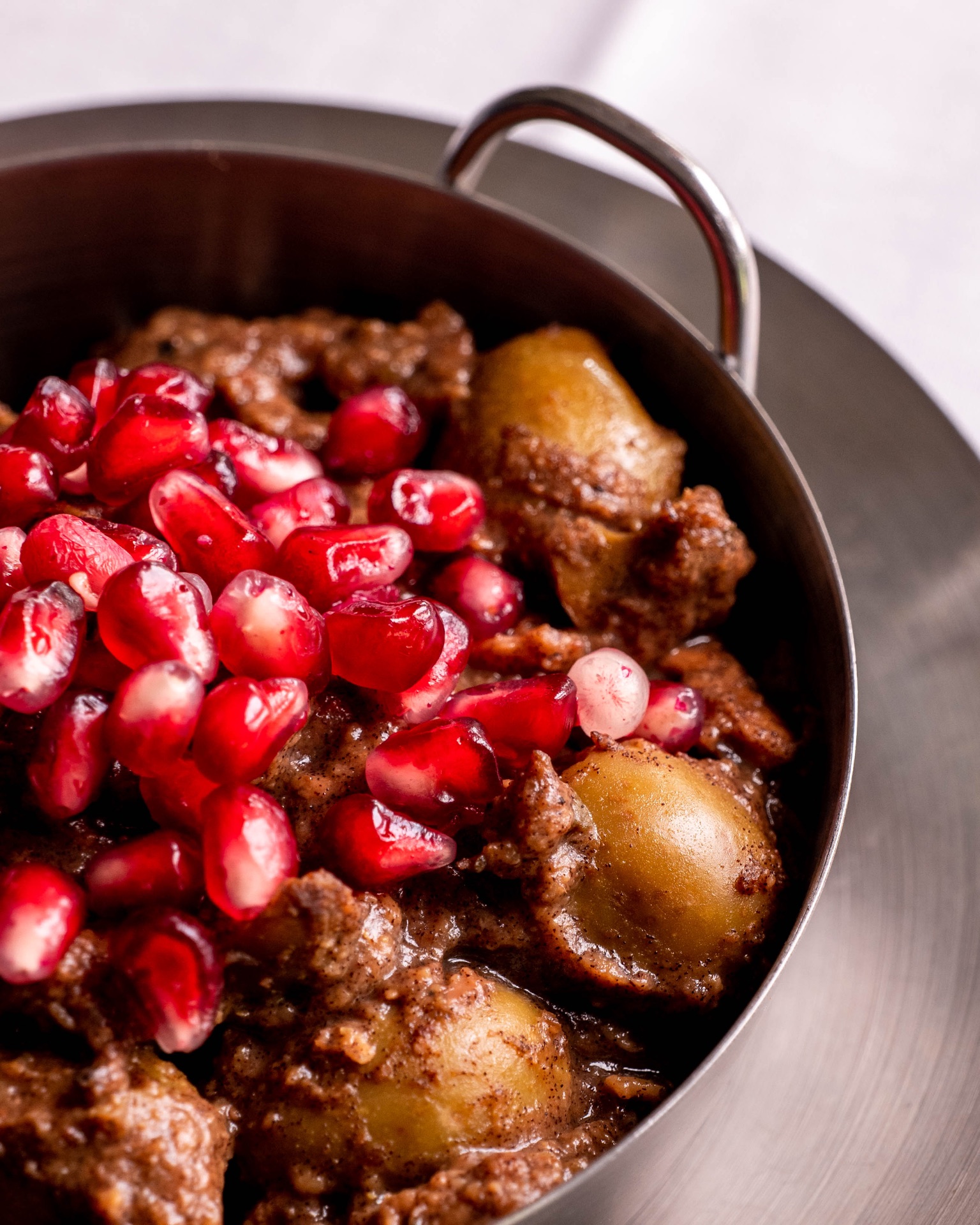 Pomegranate lamb stew